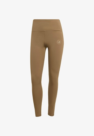 Hnědé legíny vyrobené z hladkého, elastického materiálu, s vysokým pasem a malým logem na dolní levé noze.