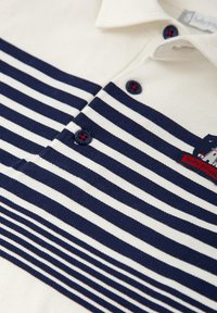 Tutto Piccolo Polo - blanco químico
