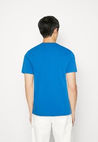 Lacoste Basic póló - hilo