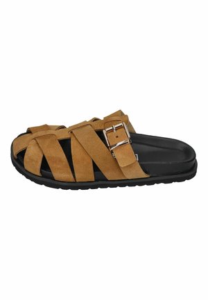 Brown suede sandal with multiple straps, silver buckle, black cushioned sole, designed for casual wear.