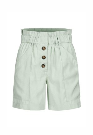 Helle grüne Shorts aus Baumwolle mit einem elastischen Bund, ausgestattet mit drei dunklen Knöpfen und schrägen Fronttaschen. Angenehm glatte Textur.