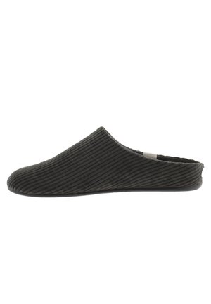 Zapatilla de felpa negra de pana con punta redondeada y suave, textura acanalada y parte trasera baja. Suela de goma plana para mayor comodidad y estabilidad.