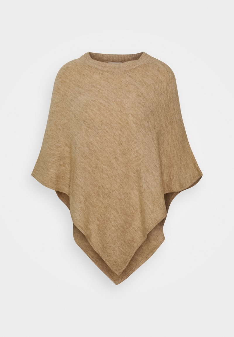 Poncho beige en tricot avec un col rond et un ourlet asymétrique, conçu pour tomber librement sur les épaules.