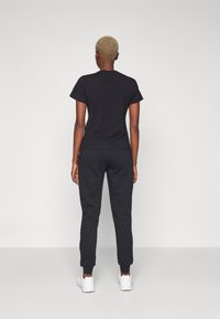 Guess STACIE JOGGER - Træningsbukser - jet black