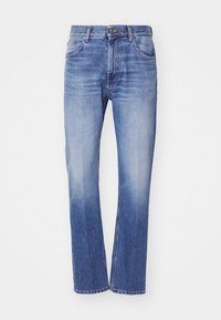 Ljusblå raka jeans tillverkade av denim. Har fem fickor, en knapp- och dragkedjestängning, samt ett blek tvättmönster med kontrasterande sömmar.