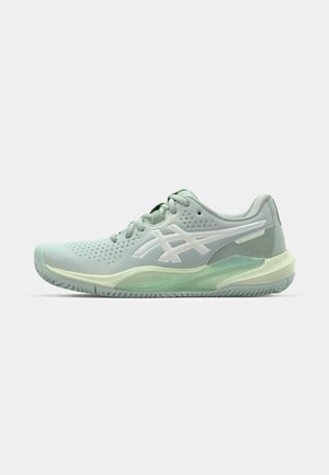 Light green athletic shoe with a textured upper, perforations for breathability, and white accents featuring a distinctive logo on the side.