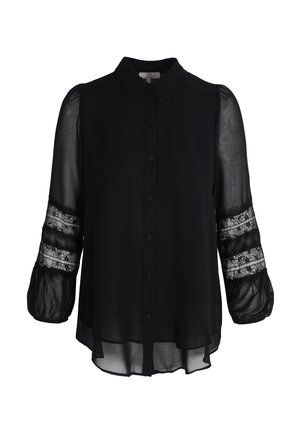 Blouse noire avec un col, une fermeture à boutons sur le devant, et des manches longues semi-transparentes avec des accents en dentelle et des détails froncés.