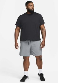 Nike Performance PRIMARY - Camiseta deportiva - black black