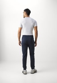 Champion ICON PANTS - Tepláky - navy