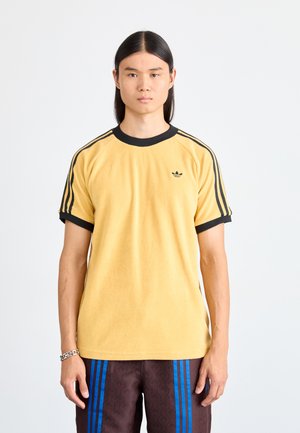 adidas Originals CALI TEE - Μπλουζάκι με στάμπα - oat
