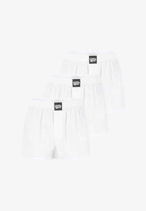 Weiße Baumwollboxershorts, präsentiert in einer Packung mit drei Stück, mit elastischem Bund und einem kleinen schwarzen Logetikett vorne.