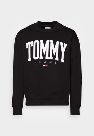 Sweat-shirt noir à col rond avec "TOMMY JEANS" en grandes lettres blanches et un petit logo de drapeau rouge, blanc et bleu centré en dessous du texte.