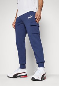 Puma CARGO PANTS - Pantalones deportivos - peacoat