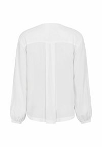 Blusa bianca con una vestibilità comoda, maniche lunghe a sbuffo e un dettaglio di cucitura centrale sul retro. Realizzata in tessuto leggero e trasparente.