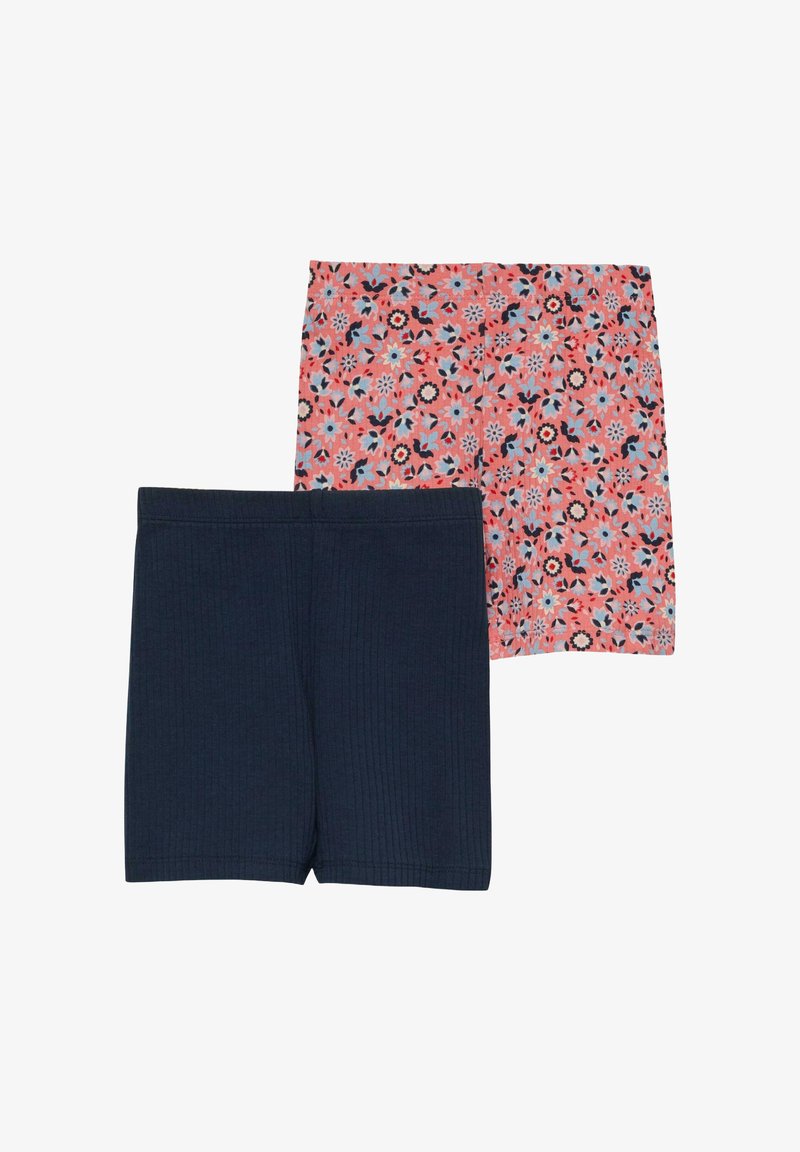 Deux paires de shorts pour enfants, un bleu marine uni et un corail avec un motif floral bleu et noir.