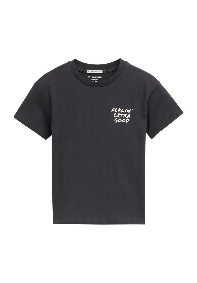 Camiseta de algodón negra con mangas cortas, cuello redondo y texto blanco "FEELIN' EXTRA GOOD" en el lado izquierdo del frente.