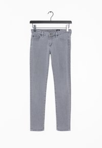 Šedé slim džíny vyrobené z denimu, s klasickým pětipocket designem a jemnými švy. Věší se na černém ramínku.