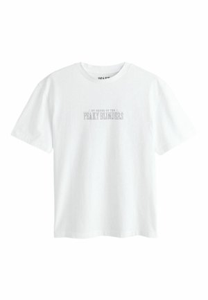 White short-sleeve crew neck t-shirt with small centered text "By Order of the Peaky Blinders" in a classic serif font.