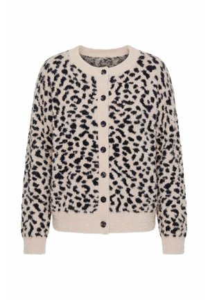 Pehmeä beigen sävyinen neuletakki, jossa mustat leopardikuviot, pyöreä pääntie, pitkät hihat, resorit hihansuut ja edessä mustien nappien rivi.
