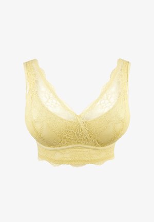 Yellow lace bralette with floral patterns, wide straps, and scalloped edges along the neckline and bottom band.