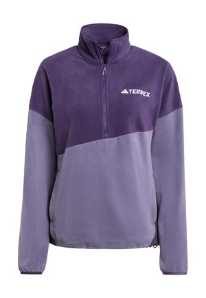 Fleece-pullover i nyanser av lilla med halv-zip krage. Har en Terrex-logo og kontrasterende fargeblokkeringsdesign. Myk tekstur.