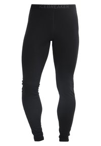 Black leggings made from a stretchy fabric with a smooth texture. Features a wide waistband labeled "ICEBREAKER" at the top.