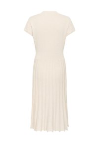 Knit dress in light beige with short sleeves. Features a ribbed upper section and a pleated lower section, creating a flowing silhouette.