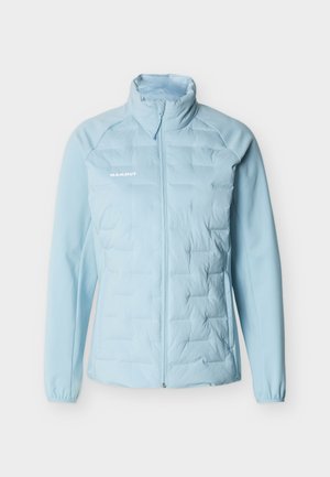 Giacca trapuntata azzurro chiaro con cerniera frontale completa, colletto alto, polsini elasticizzati e logo "Mammut" sul petto sinistro.
