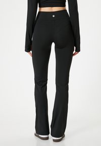 Koton FLARE SPORTS - Legging - black
