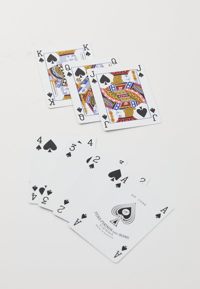Deck of playing cards featuring spade suits. The face cards display intricate designs with vibrant colors. Number cards are simple in black and white.