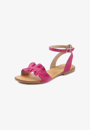 Rosa Wildledersandalette mit einem Rüschendesign am Riemen, einem Knöchelriemen mit Schnalle und einer flachen Holzsohle.
