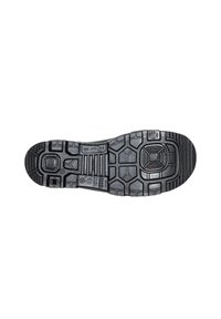 Black rubber shoe sole with textured tread pattern, featuring hexagonal and rectangular shapes for traction, along with embossed logos.