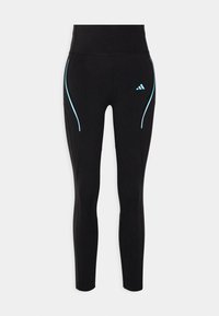 Leggings noirs avec une taille haute, présentant des accents réfléchissants bleu clair et un logo Adidas sur la cuisse gauche. Texture lisse.