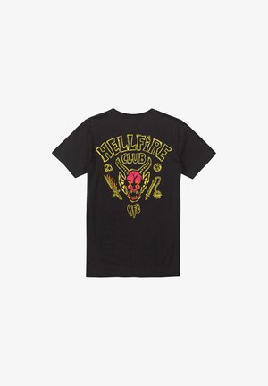 Schwarzes Baumwoll-T-Shirt mit auffälligem gelb-rotem Grafikdruck eines Teufelsschädels und dem Text "HELLFIRE CLUB" auf der Rückseite.