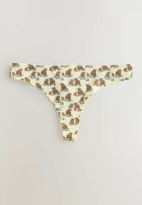 String jaune avec un motif ourson marron et fleurs bleues et un petit nœud jaune au centre de la ceinture.