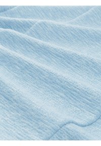 Light blue fabric with a textured surface, featuring a subtle pattern of fine lines and waves. Notable softness and pliability evident.