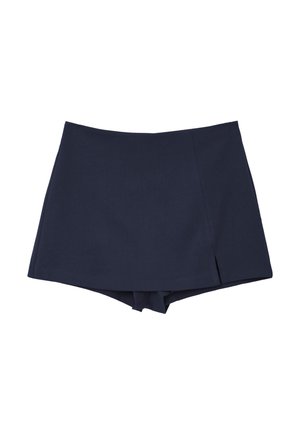 Jupe-culotte bleu marine avec un devant croisé et une longueur courte, présentant une petite fente sur le côté droit.