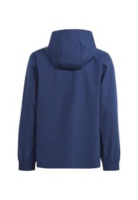 Veste de pluie bleu marine avec capuche, dotée de poignets élastiques, d'une texture lisse et d'un design basique. La vue arrière ne montre pas de détails supplémentaires.