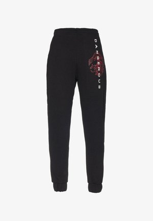 Mustad mustad mustra, millel on elastne vöökoht ja tihedad varrukad, ning punane graafiline kujundus, kus on sõna "DANGEROUS" külje peal.