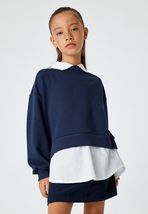 - Bluza