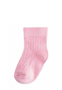 Chaussette pour bébé en rose doux côtelée avec bord replié, conçue pour le confort et la chaleur, présentée sur fond blanc.