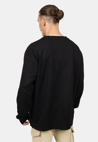 Blackskies OVERSIZED LONG SLEEVE UNISEX - Top s dlhým rukávom - schwarz