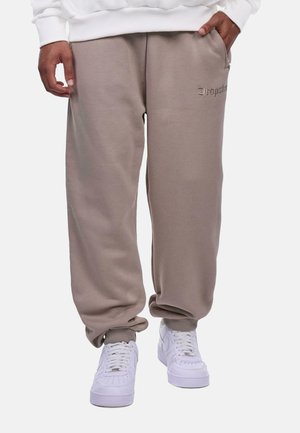 JOGGER - Tracksuit bottoms - simplytaupe