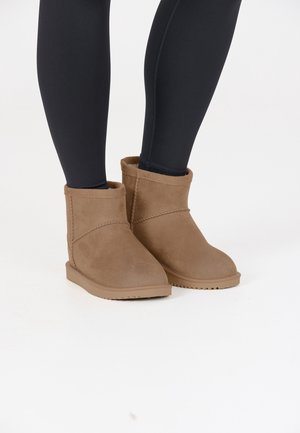 Botas para la nieve - brown