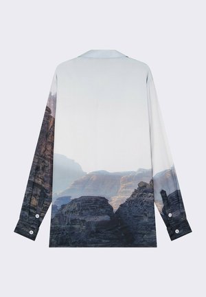 Long-sleeve shirt with a landscape print; features soft fabric, button-down collar, and buttons on the cuffs; colors blend from light to dark tones.
