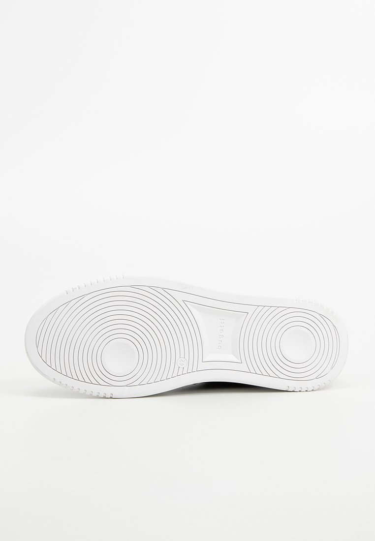 Suela de zapato de goma blanca con patrón texturado circular; diseño plano con un acabado suave y un sutil detalle de marca en la suela.