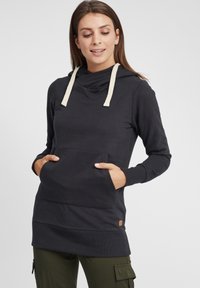 Felpa con cappuccio grigio scuro, con collo a scialle, lacci, tasca frontale e polsini a costine. Tessuto morbido con vestibilità comoda.