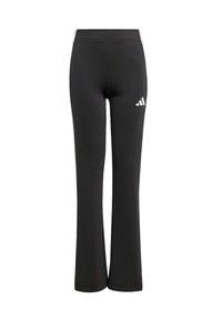 Crne sportske hlače od rastezljivog materijala s flared dizajnom, s malim bijelim logotipom na stražnjoj strani. Glatka tekstura kroz cijeli materijal.