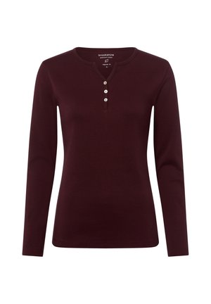 Dark burgundy long-sleeve henley shirt with three white buttons and round neckline, labeled regular fit, made of premium cotton.