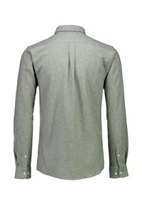 Grijze langekous T-shirt met knoopsluiting, met een zachte textuur en een rechte snit. Opvallende knopen bij de manchetten.